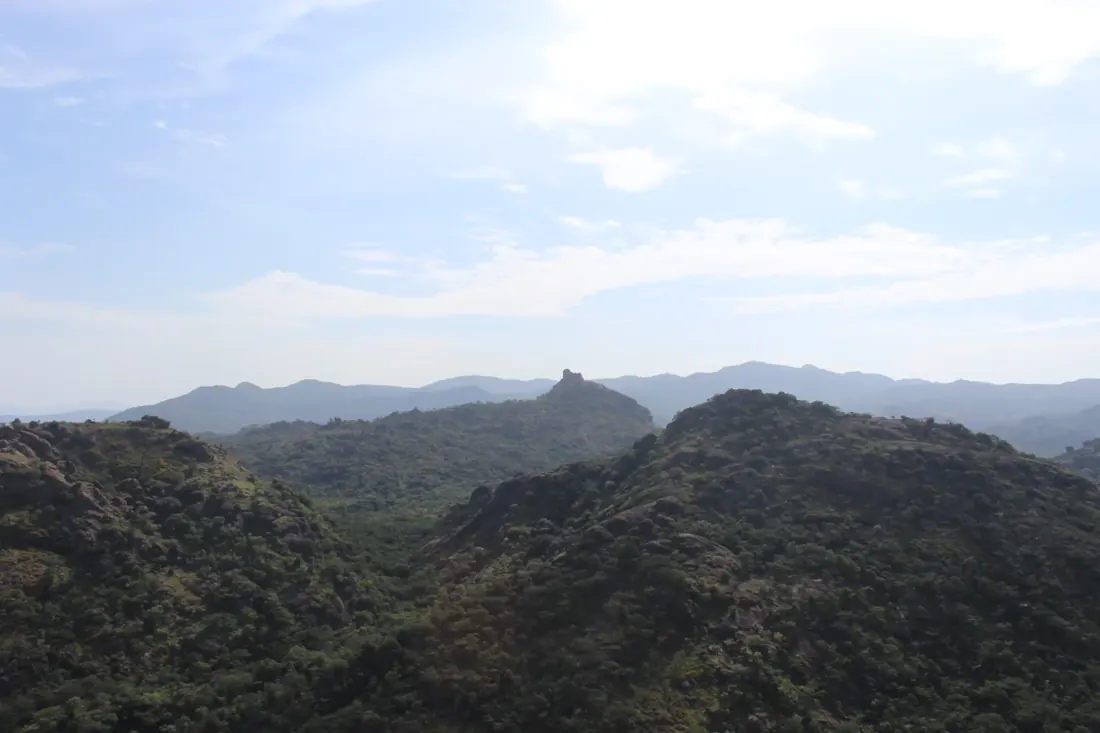 Rock formations and green terrain in Shere Hills on the Jos Plateau.