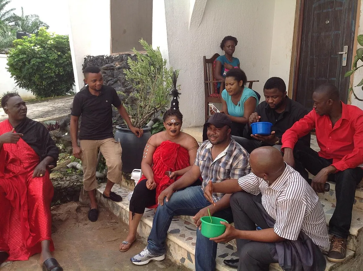 A crew and actors working on a Nollywood film set in Awka, Nigeria.